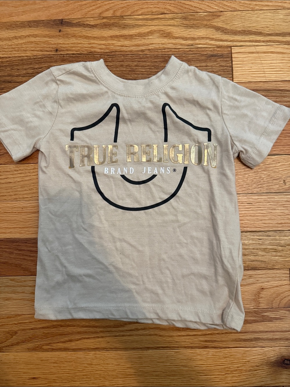 True Religion Kids Cream Tee with Gold Logo and Black Graphic